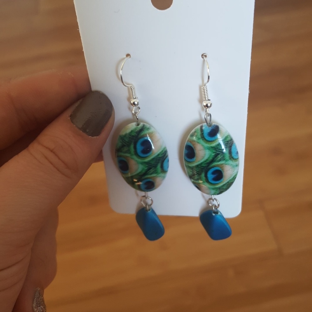 Women's💙💚 Low Hanging/ Peacock earrings💚💙
